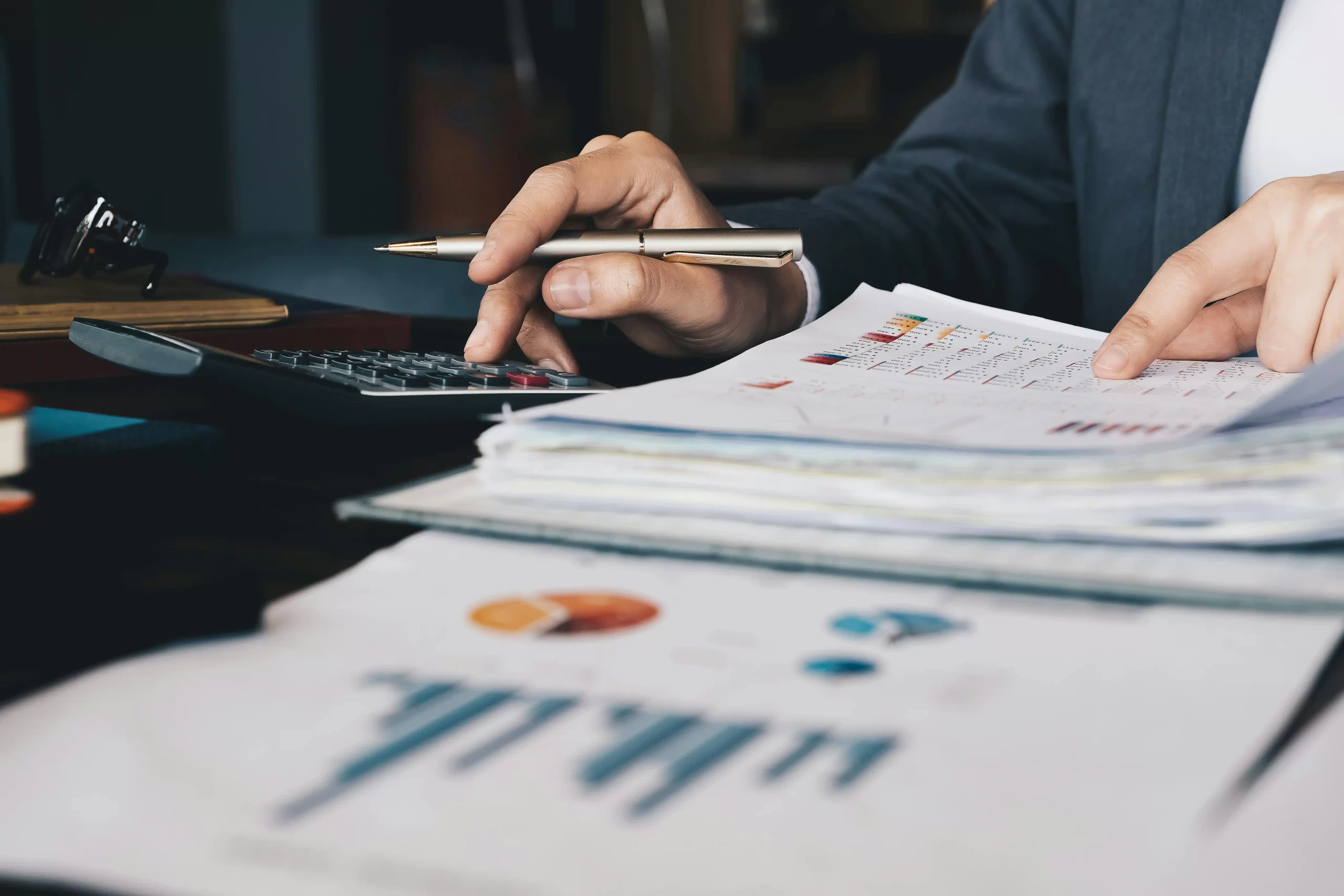 Small business owner reviewing input VAT and output VAT figures
