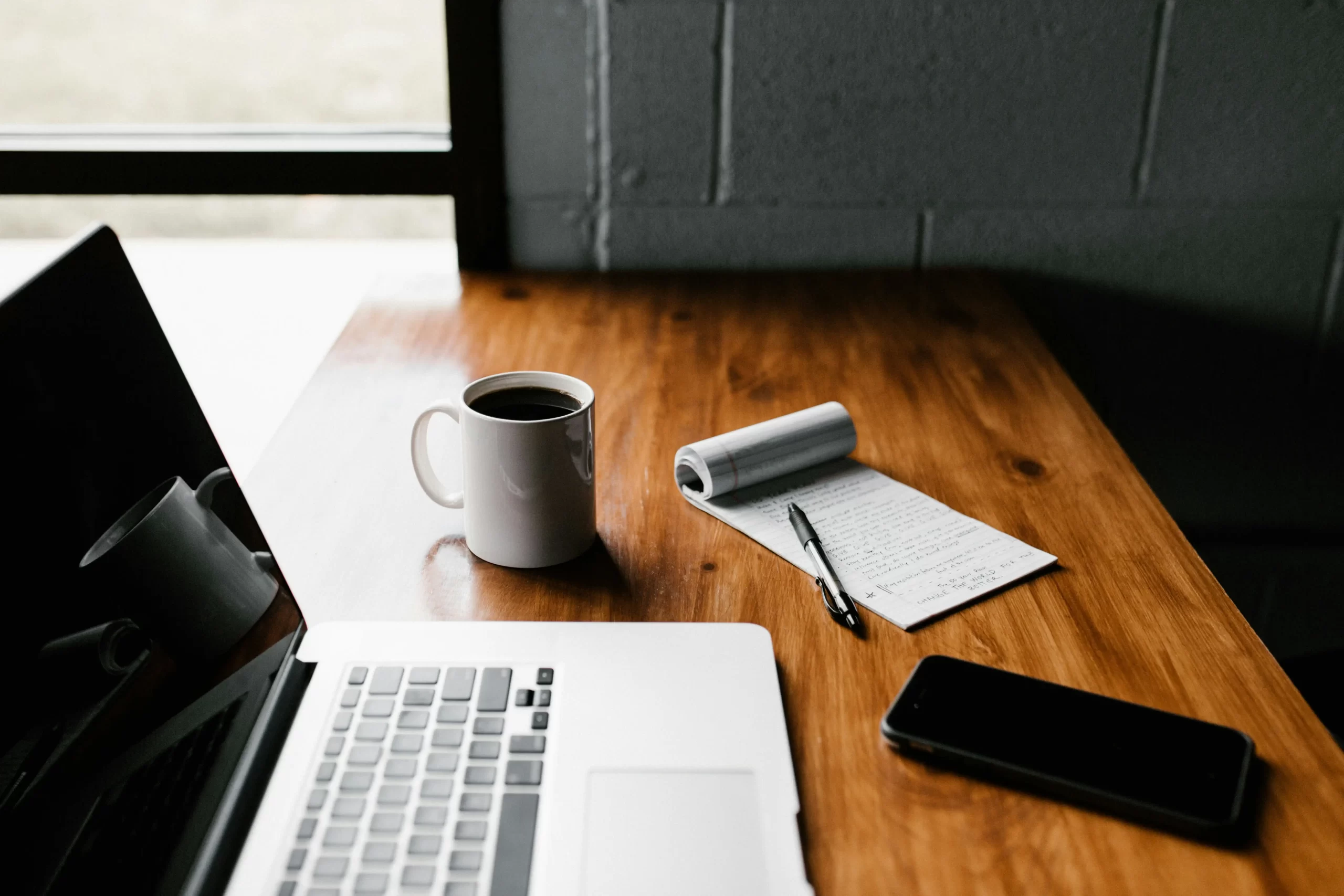 Self-employed person reviewing PAYE income and tax return records in 2026