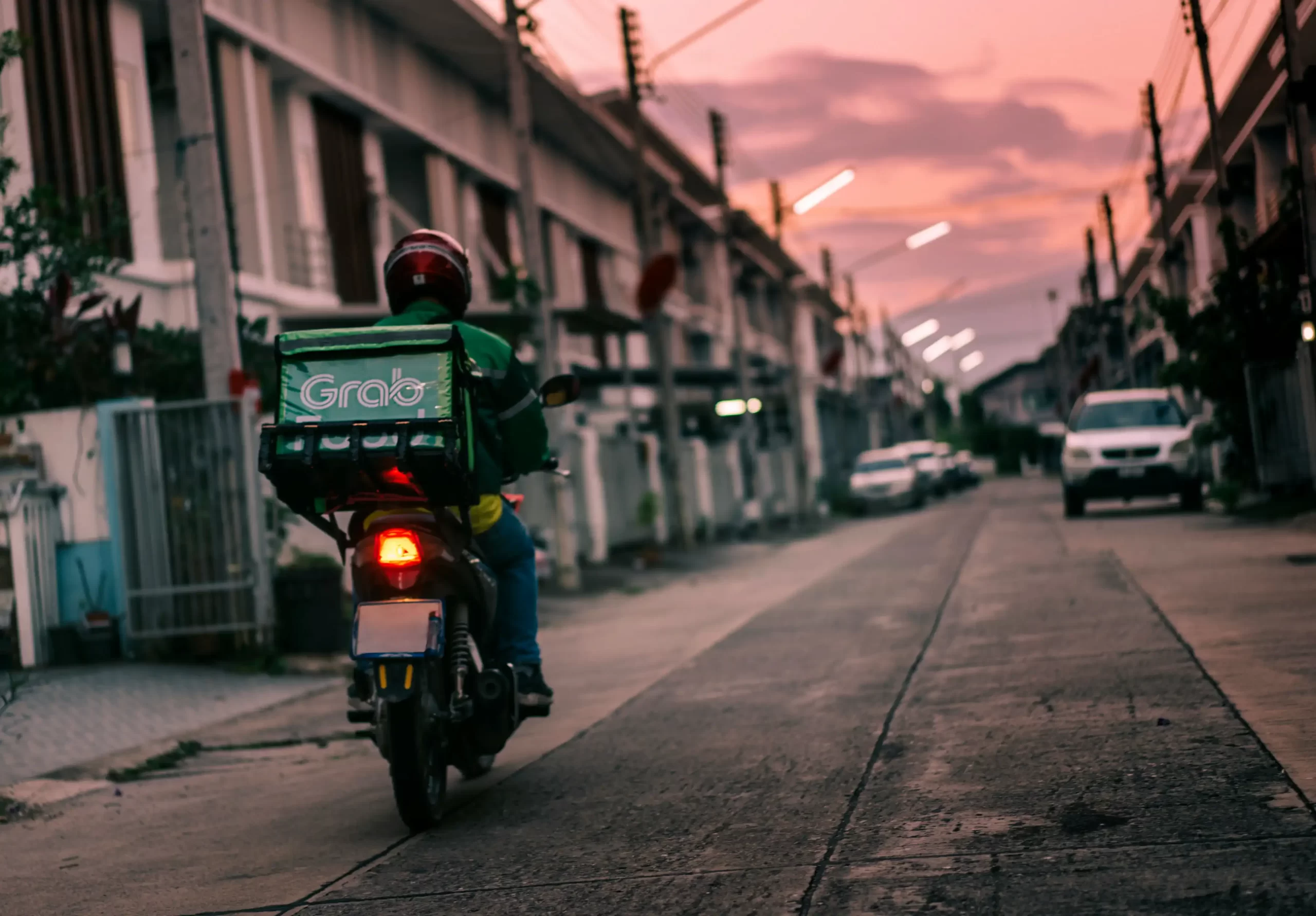 Self-employed delivery driver reviewing courier accounts and tax records