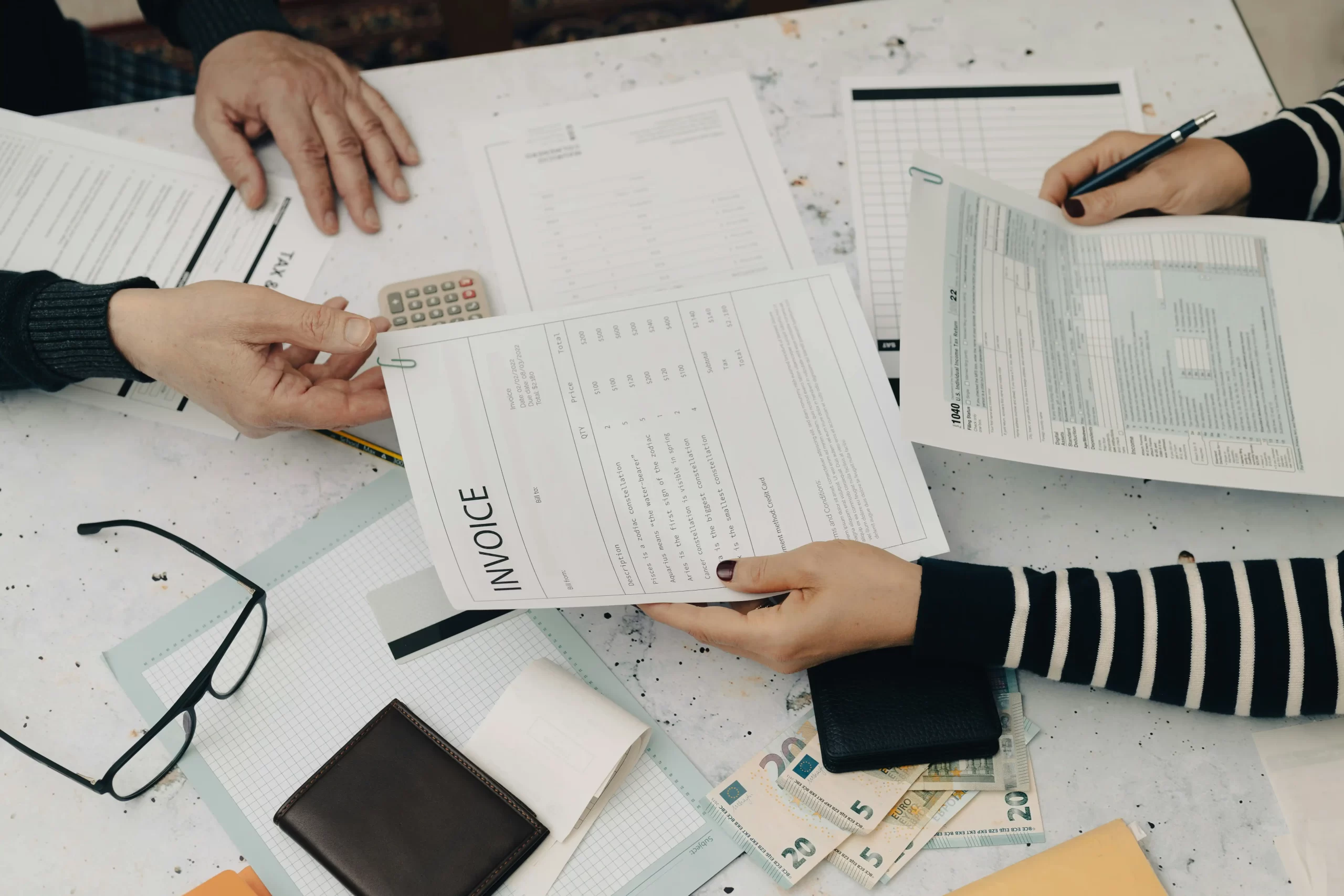 Sole trader organising invoice records for HMRC and tax return support