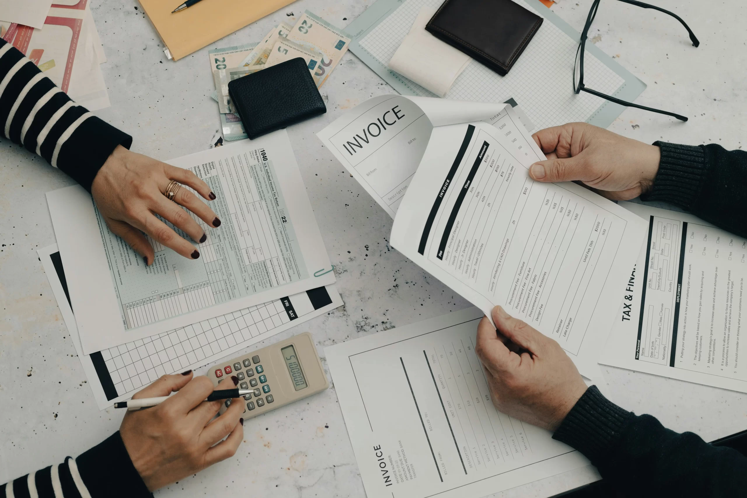 Sole trader reviewing monthly tax budget for HMRC bill in 2026